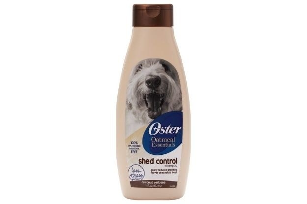 A bottle of tan shampoo with fluffy white dog on it