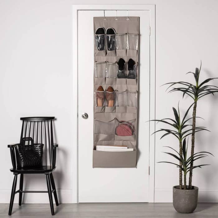 The overdoor organizer with various items inside