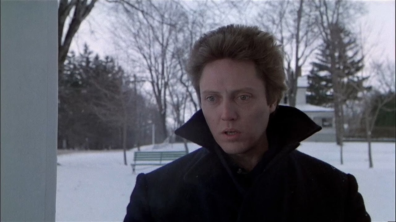 Christopher Walken outside in the cold wearing a jacket