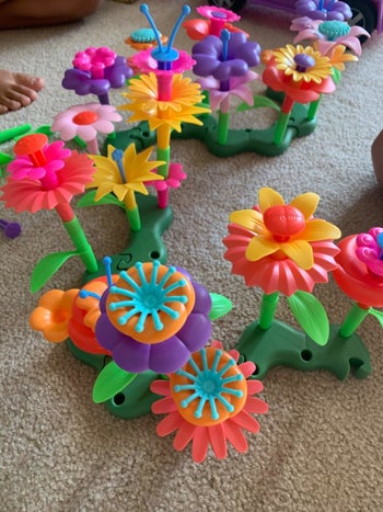 Reviewer's photo of plastic flower toys