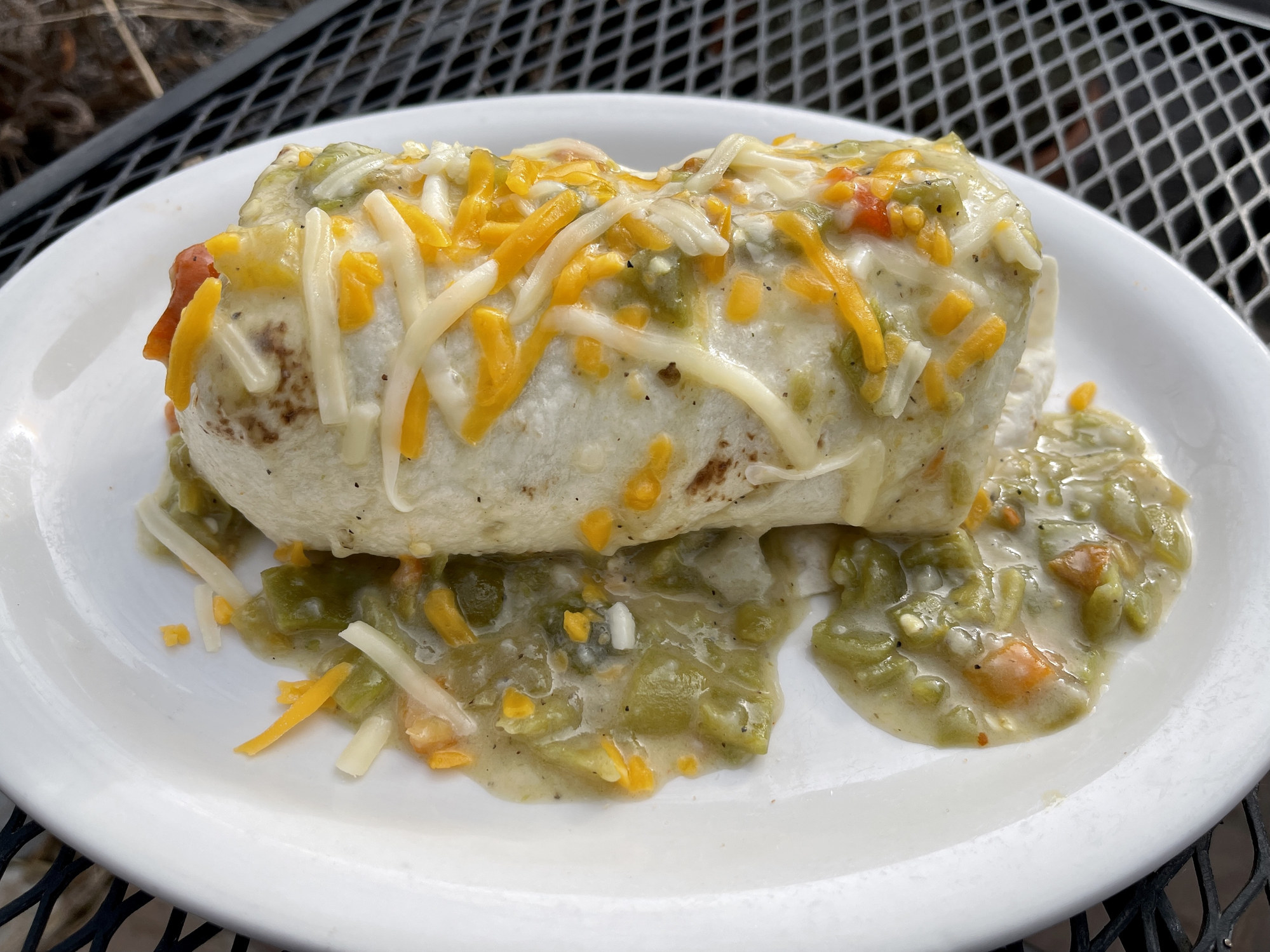 A burrito with green chile.