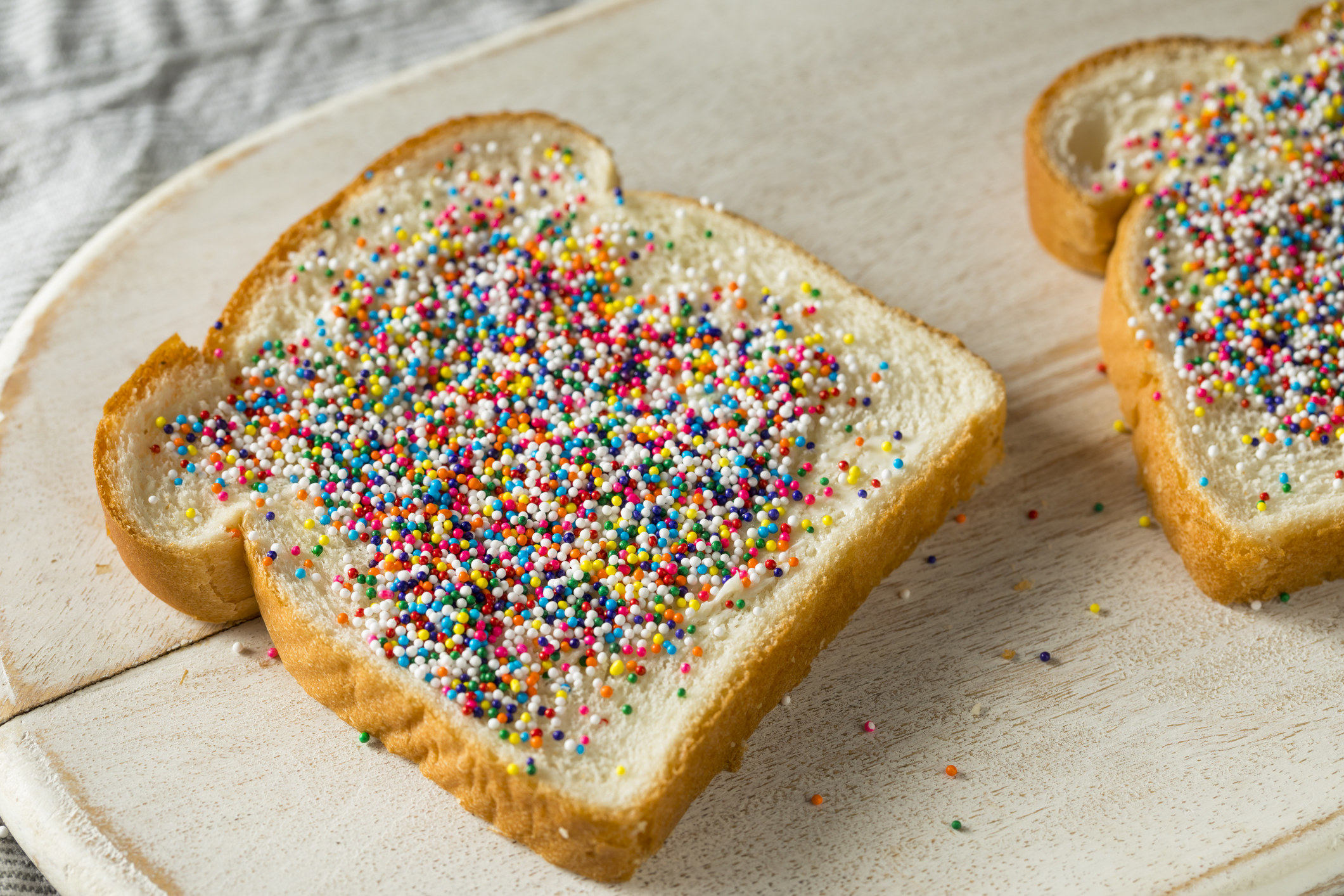 White bread with butter and sprinkles