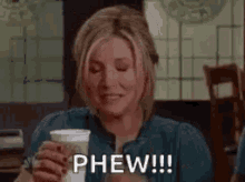 Elliot from Scrubs saying &quot;phew!&quot; while holding coffee