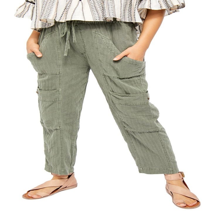 green loose-fit pants with a drawstring waist
