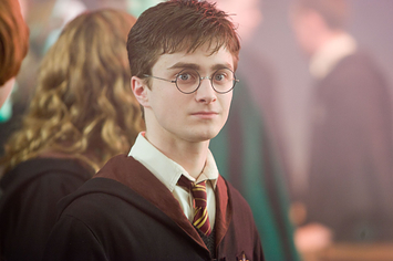 Daniel Radcliffe stares into the distance as Harry Potter