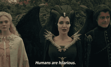 A GIF of three women with the caption &quot;Humans are hilarious&quot;