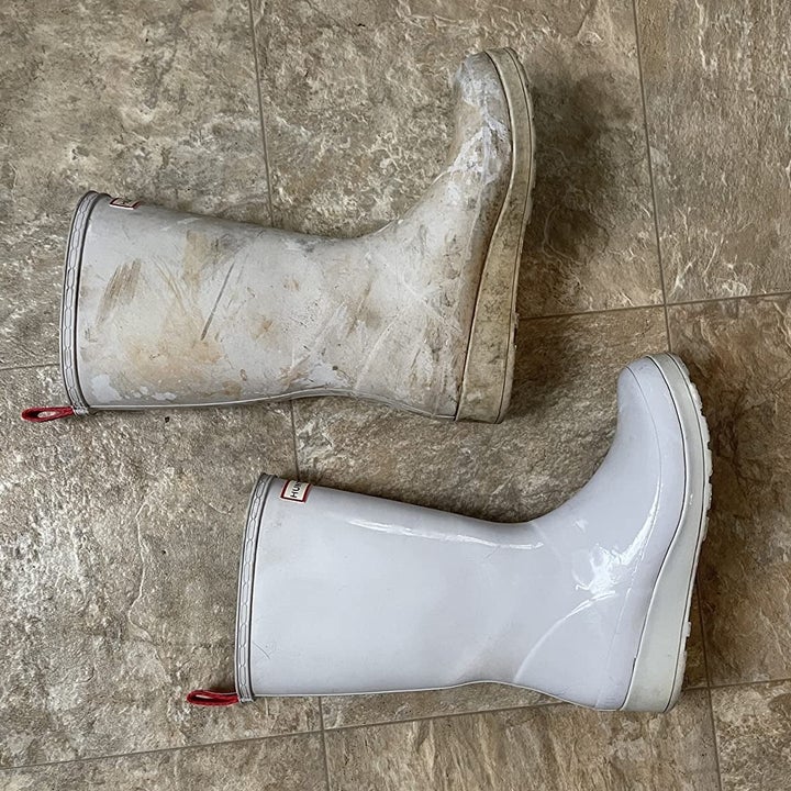 a reviewer's rubber boots, one stained with dirt and one clean