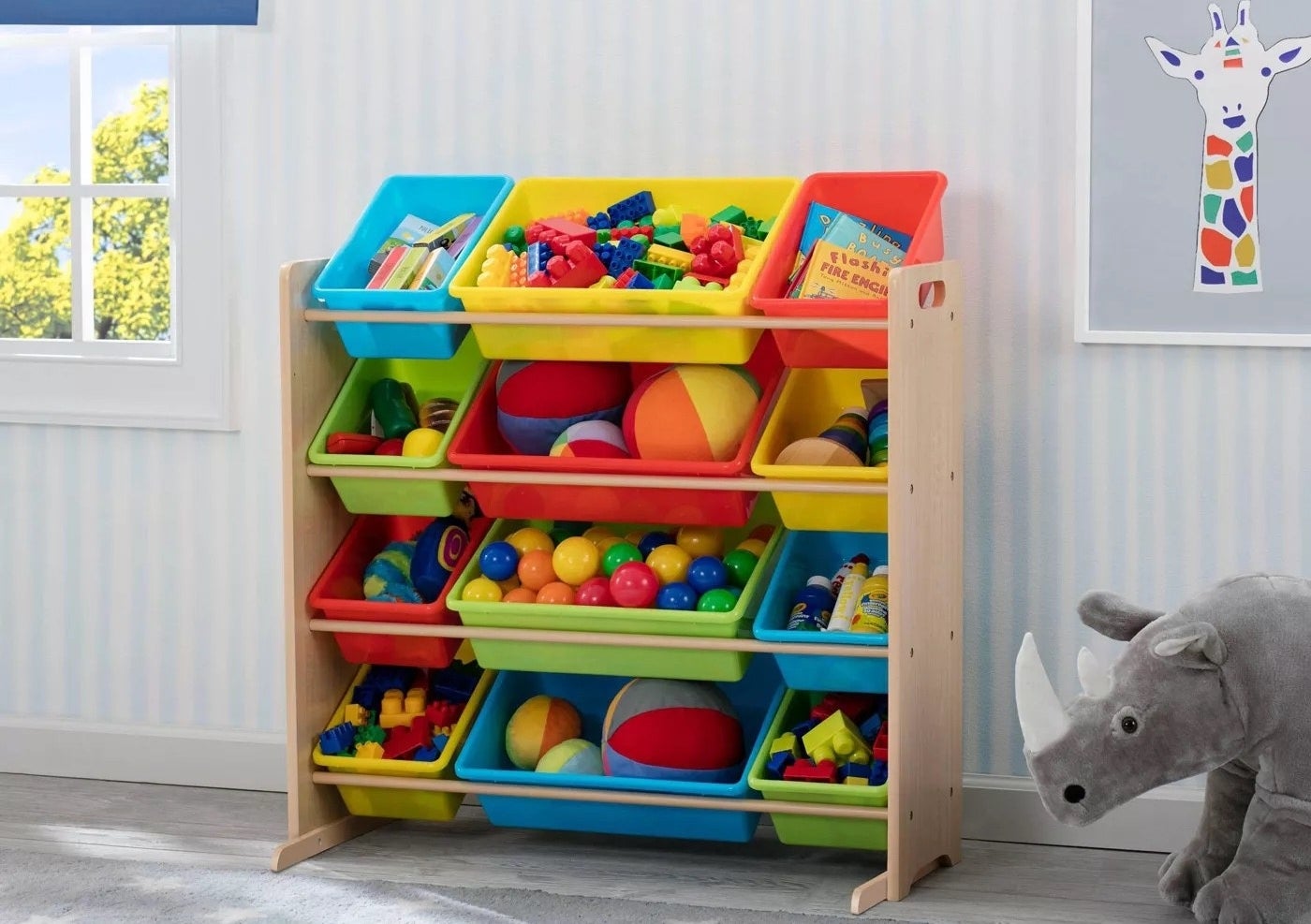 The toy storage organizer filled with assorted items