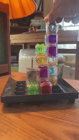 Reviewer's video showing the marble falling through a maze of stacked cubes