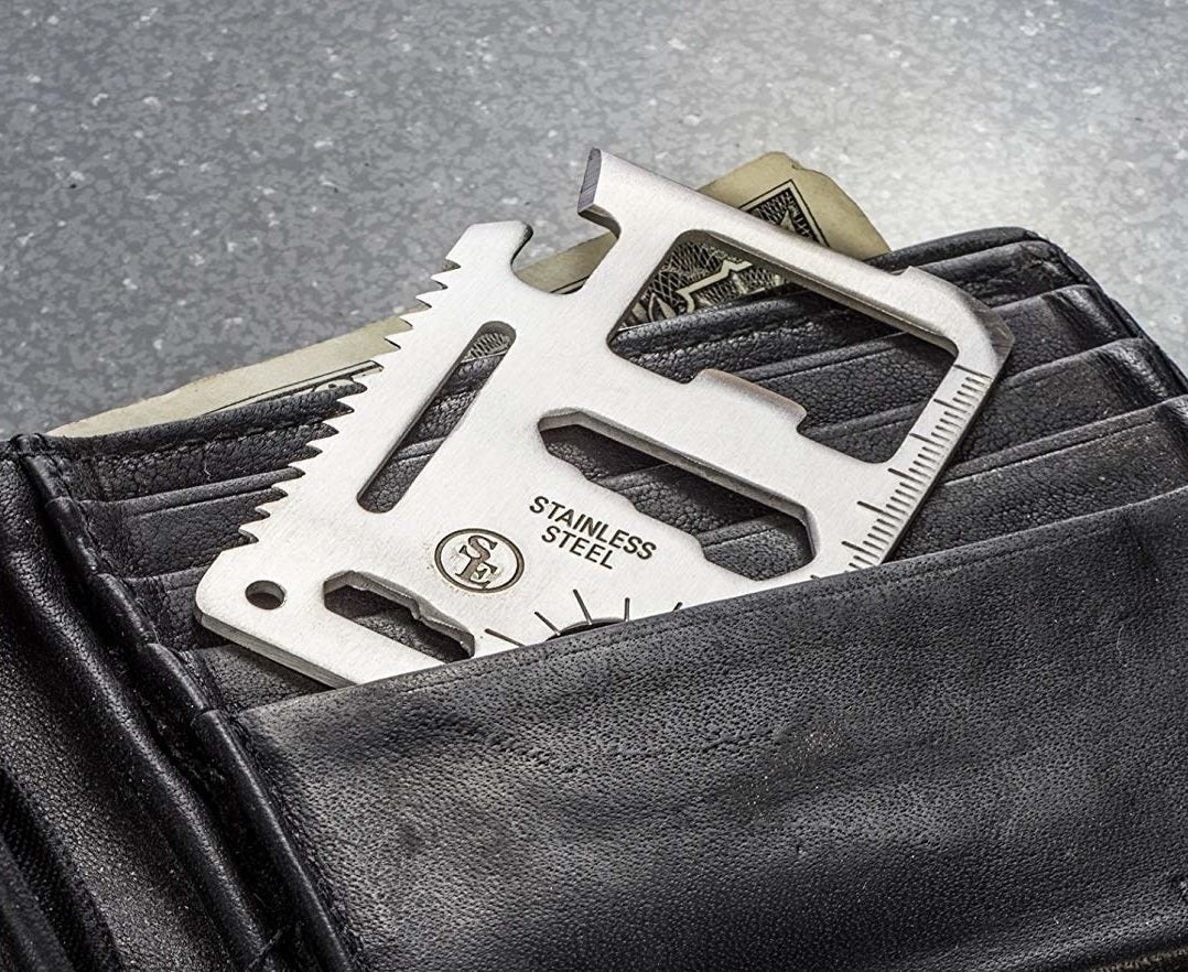 The tool sliding into a wallet pocket