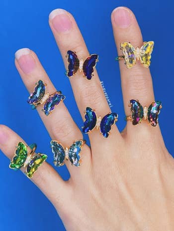 model wearing the crystal rings in different colors