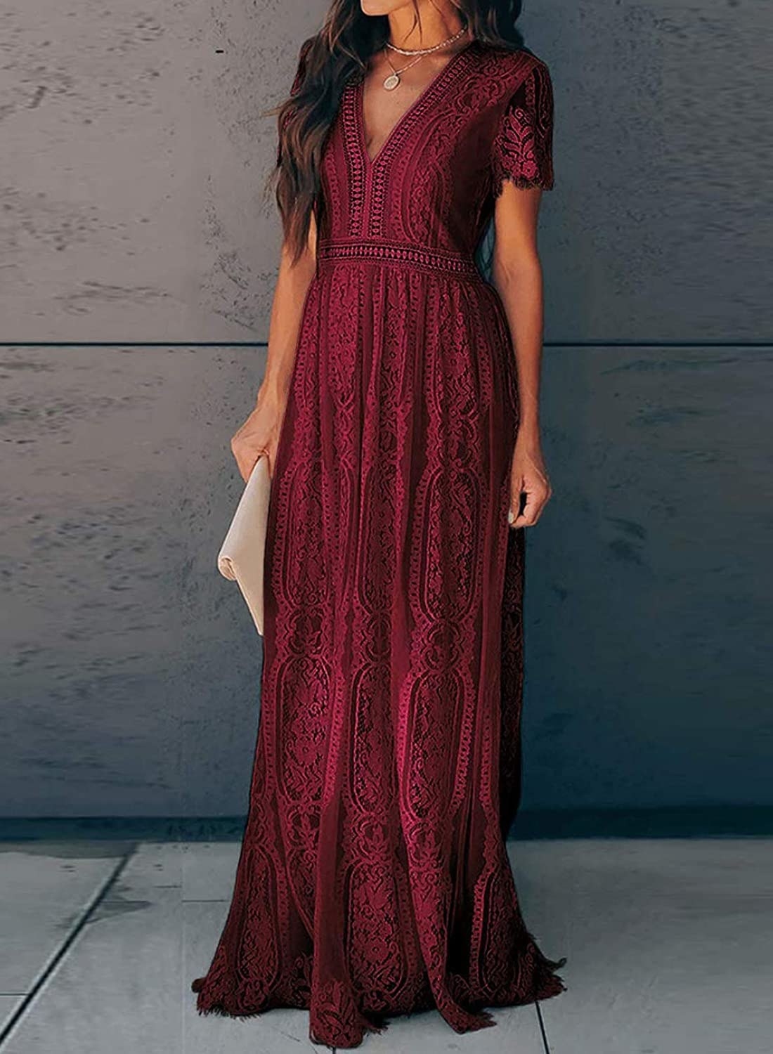model wearing the burgundy dress with lace-like detailing