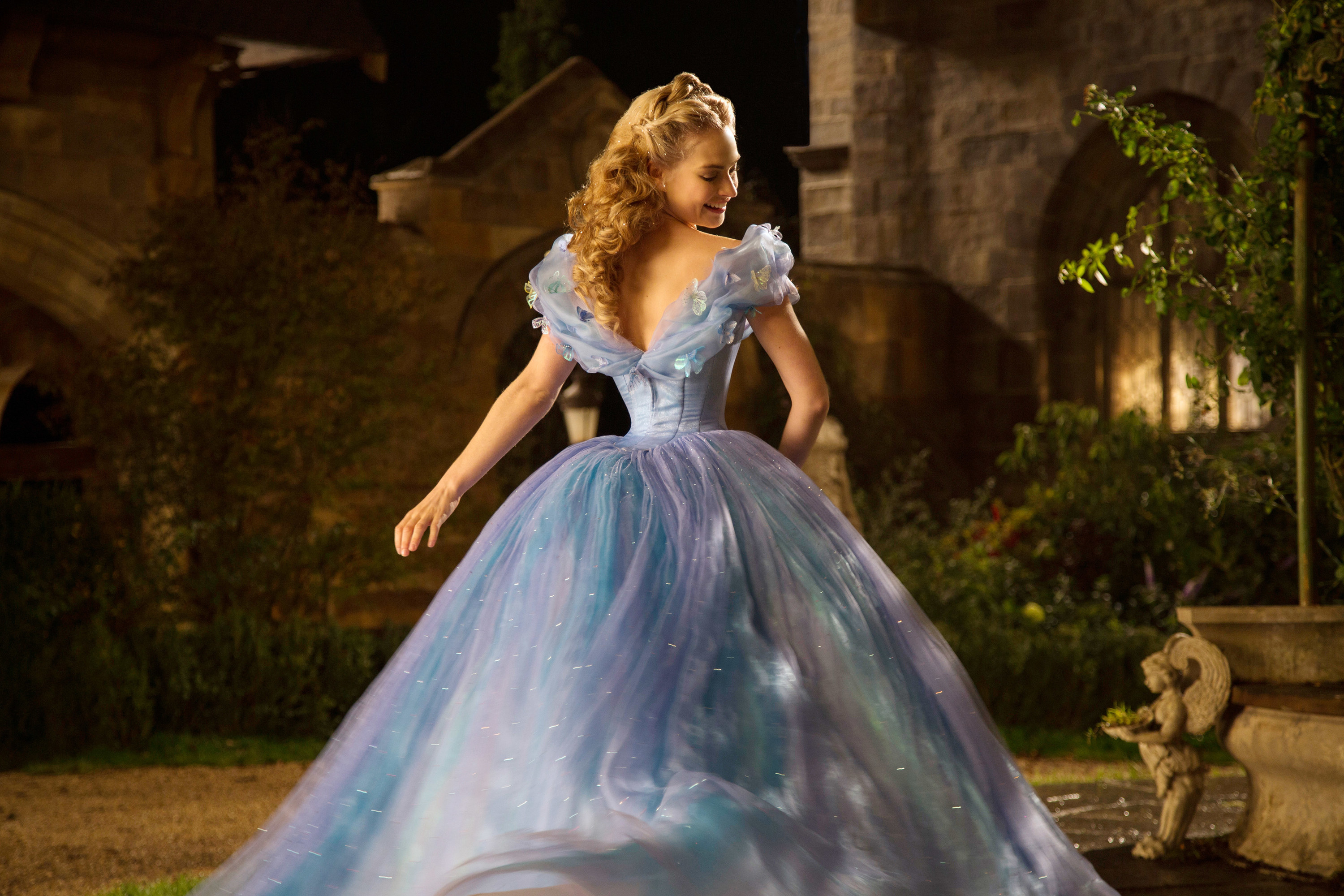 Cinderella wearing an off-the-shoulder ballgown