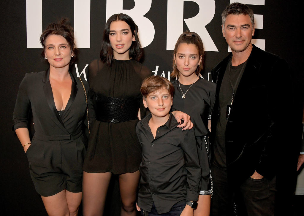 Dua Lipa with her immediate family at an event.