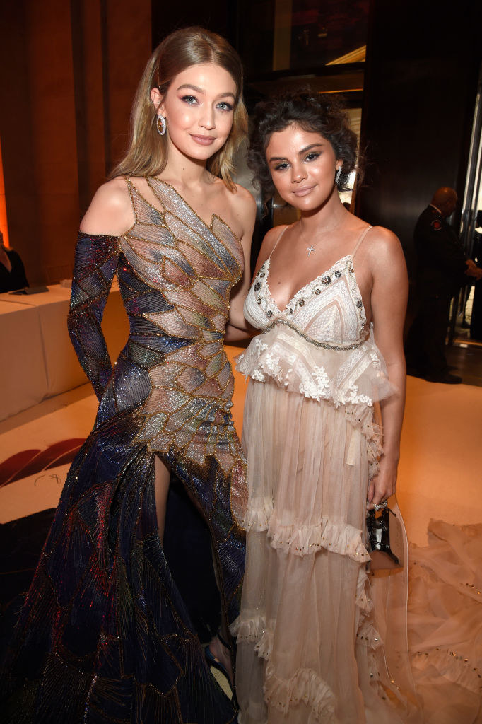 Gigi Hadid (L) and Selena Gomez attend the Heavenly Bodies: Fashion &amp; The Catholic Imagination Costume Institute Gala