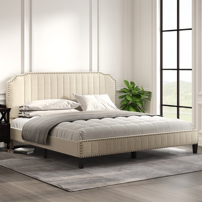 The taupe bed in use