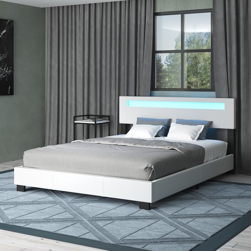 The bed in silver PU with a blue light on