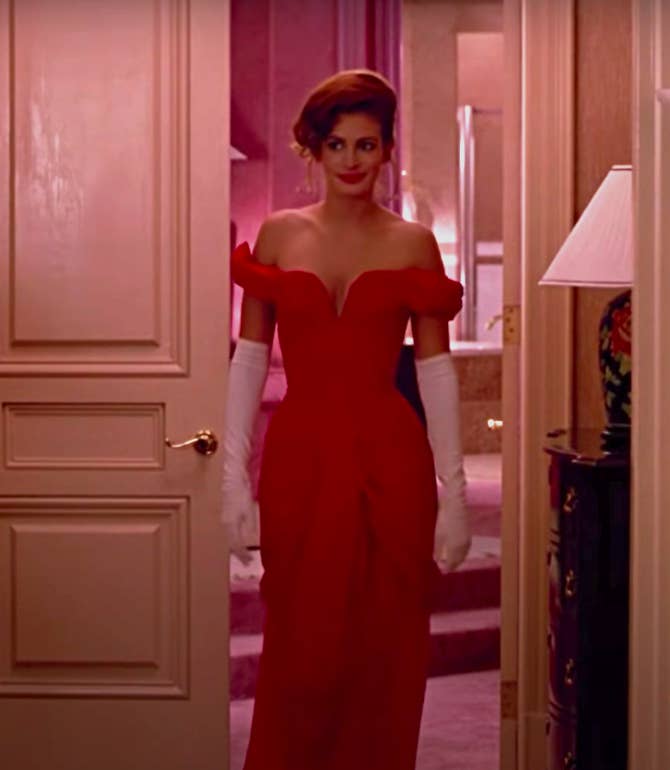 Vivian wearing an off the shoulder gown