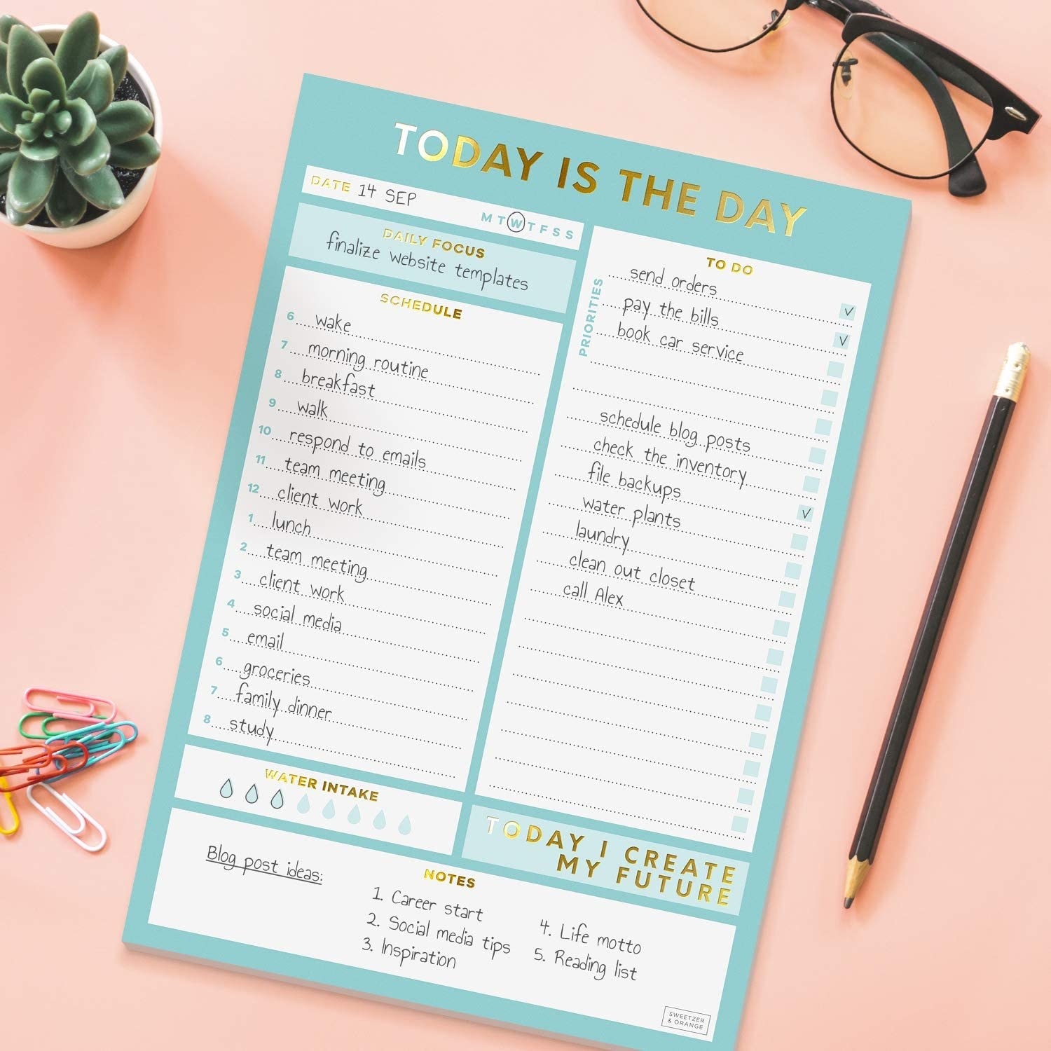 The to-do list on a table surrounded by stationery supplies