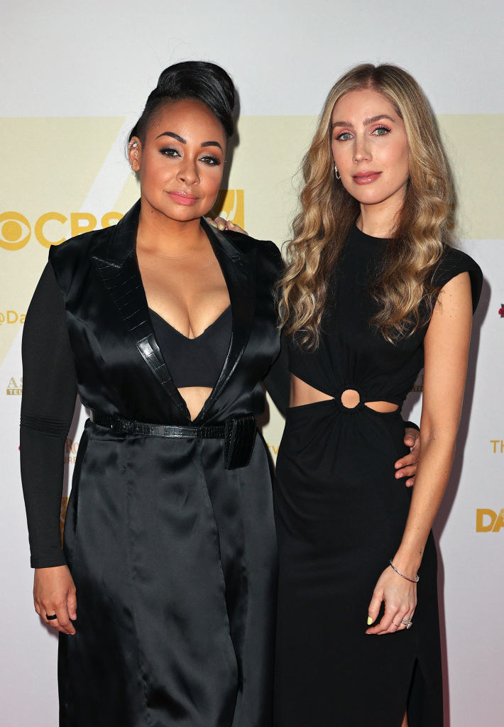 Raven and Miranda posing on a red carpet together at an event