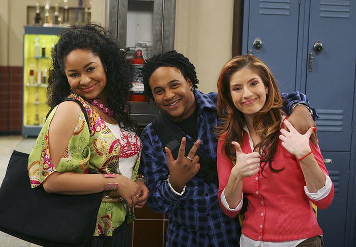 The cast of That&#x27;s So Raven posing for a photo on set in front of lockers