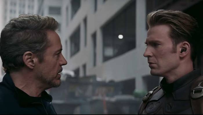 tony and steve look at each other with furrowed brows