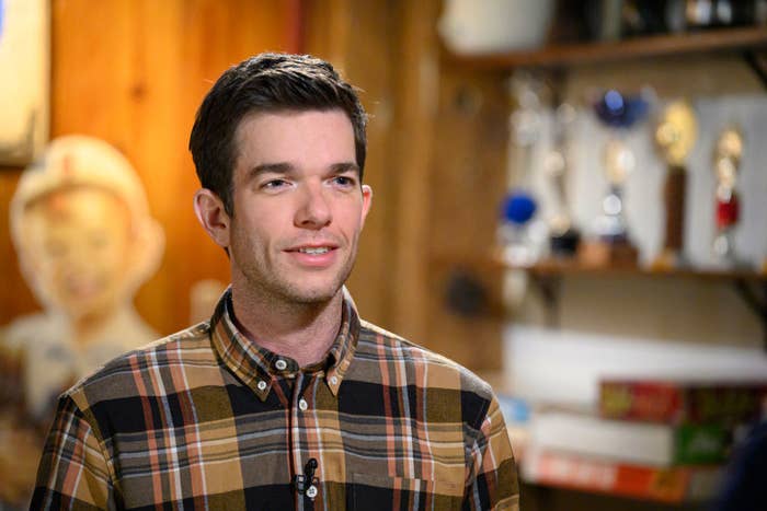 John, in a plaid shirt, during an interview