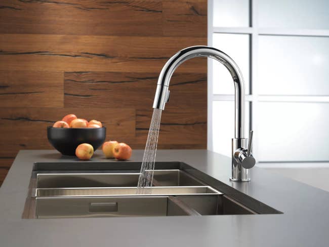 The faucet with one handle and a pull-down wand