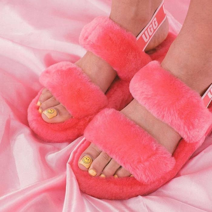 A pair of brightly-coloured fuzzy sandals