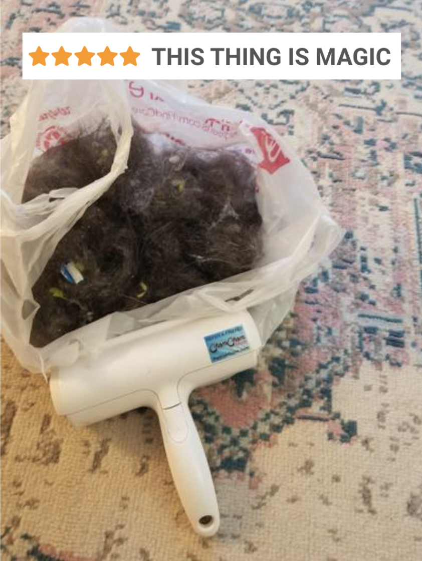 reviewer&#x27;s picture of the pet hair roller next to a garbage bag filled with fur with five-star caption &quot;this thing is magic&quot;