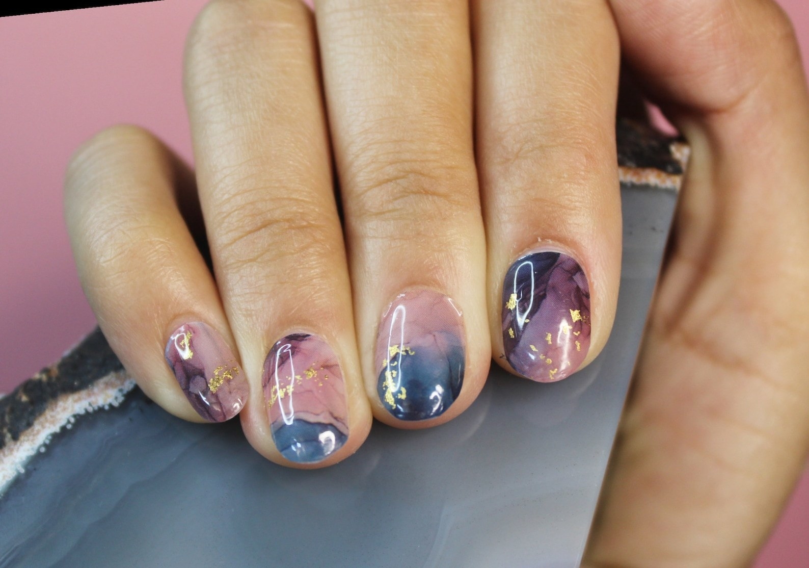 the dark blue and purple marble designed nail wraps