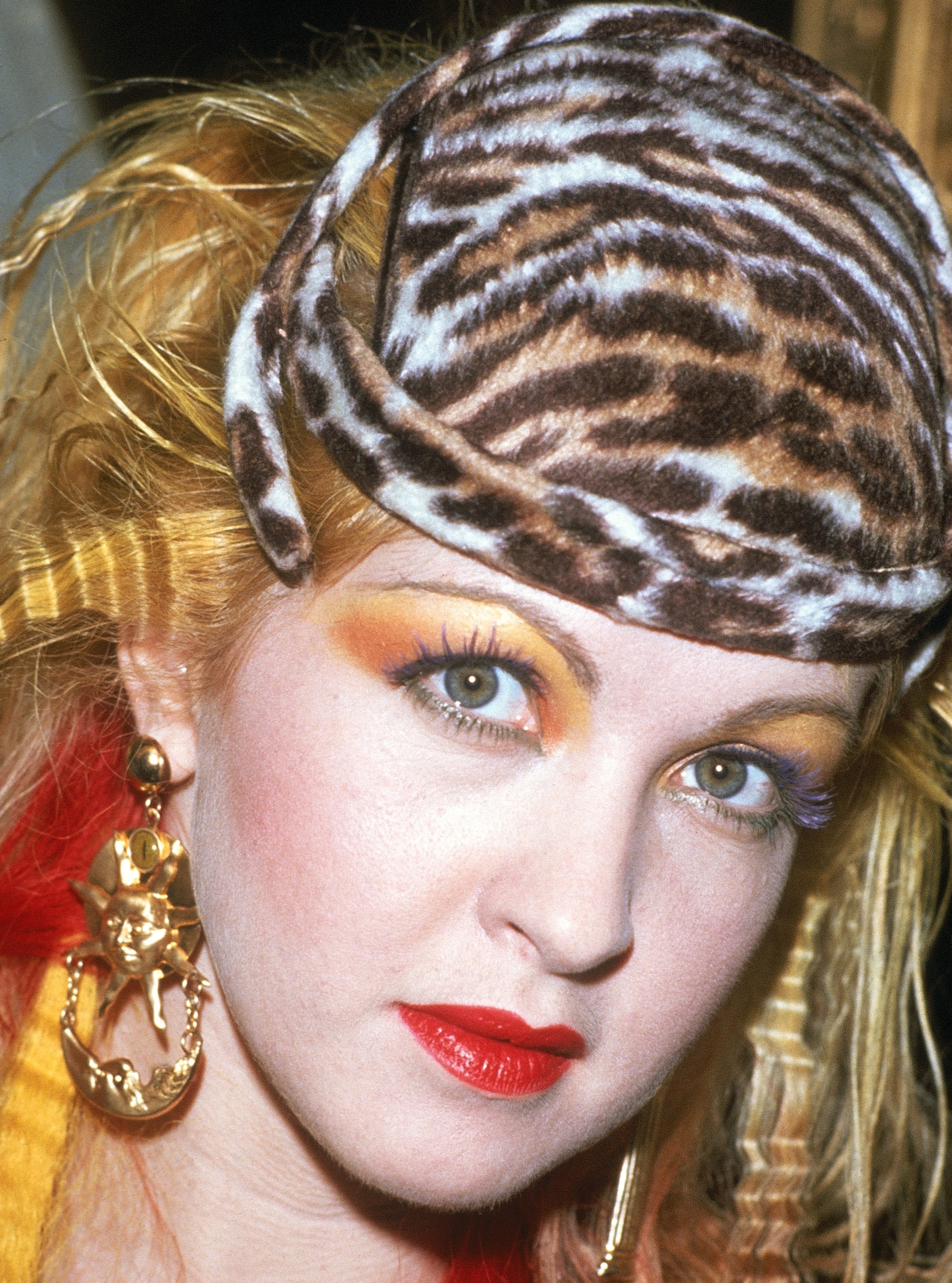 Close up photo of Cyndi Lauper in vivid eye makeup