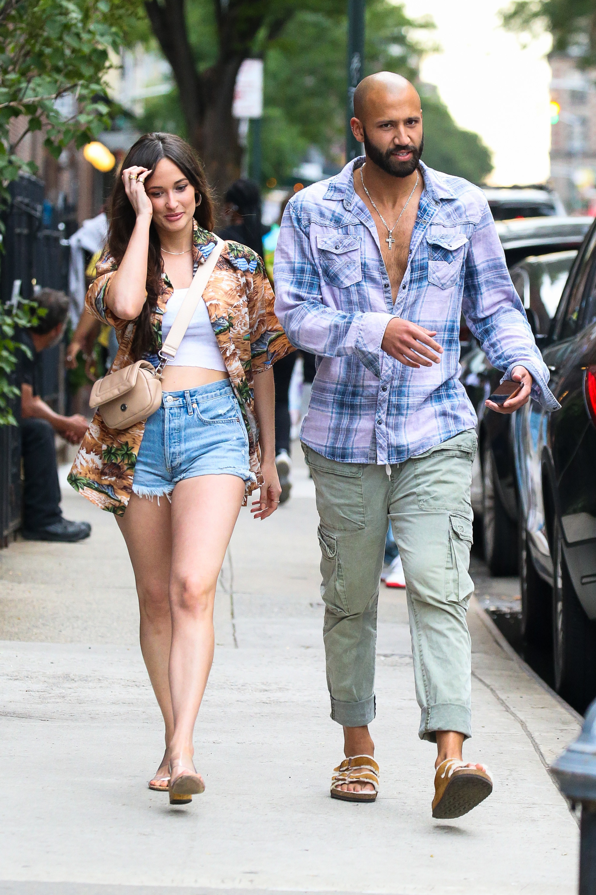 Kacey and Cole stick close together while on a walk in new york