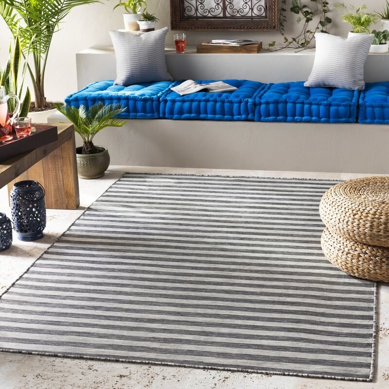 Rug displayed in an outdoor patio.