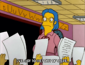 Teacher in &quot;The Simpsons&quot; universe is in a class with a bunch of students holding up papers at her. Overwhelmed she says &quot;I&#x27;ve got to get out of here.&quot;