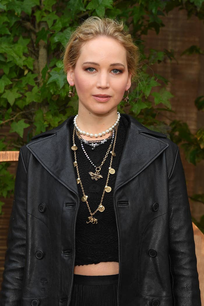 Jennifer Lawrence poses for a picture at a red carpet event