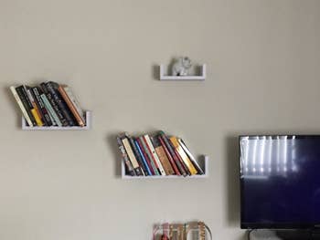 Reviewer's wall with three shelves installed