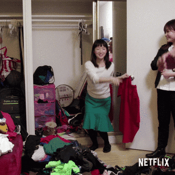 Gif of Marie Kondo in &quot;Tidying Up&quot;