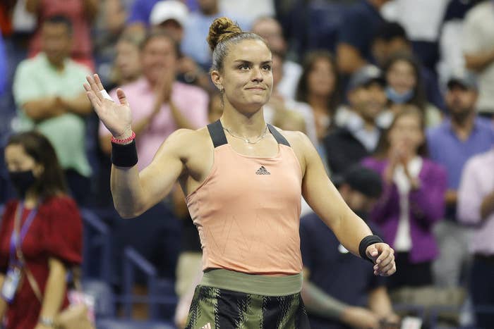 Maria Sakkari waves to the crowd