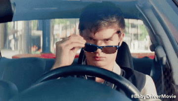 Ansel Elgort in Baby Driver starting a car chase