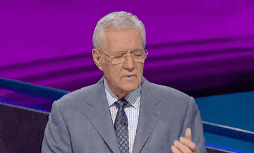 Alex Trebek counting on his fingers