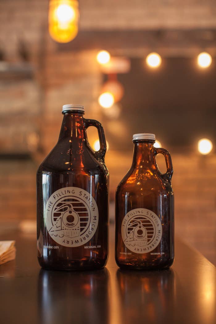 Two beer growlers.