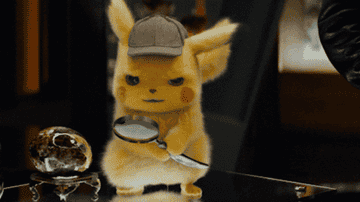 Pikachu from &quot;Pokémon: Detective Pikachu&quot; looks through a spy glass.