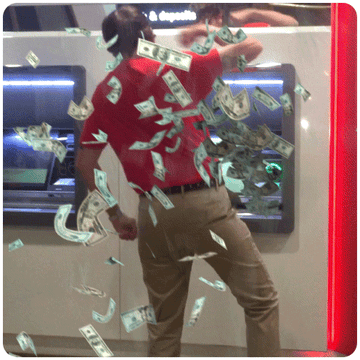 Man stands at ATM machine and fist pumps while money flies around him.