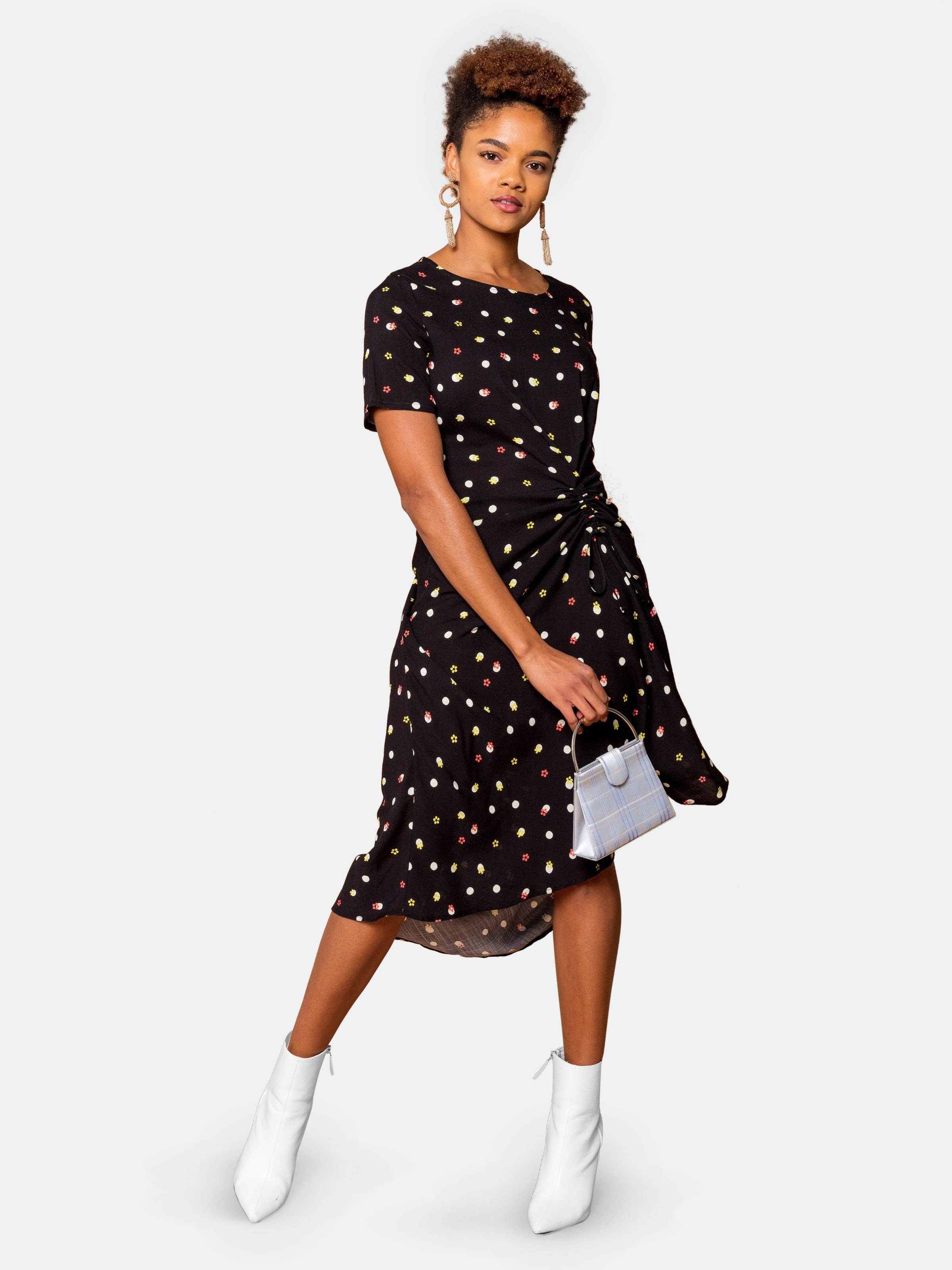 model wearing the polka dot dress