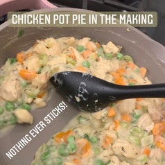 Me making the filling for a chicken pot pie with text "nothing every sticks!"