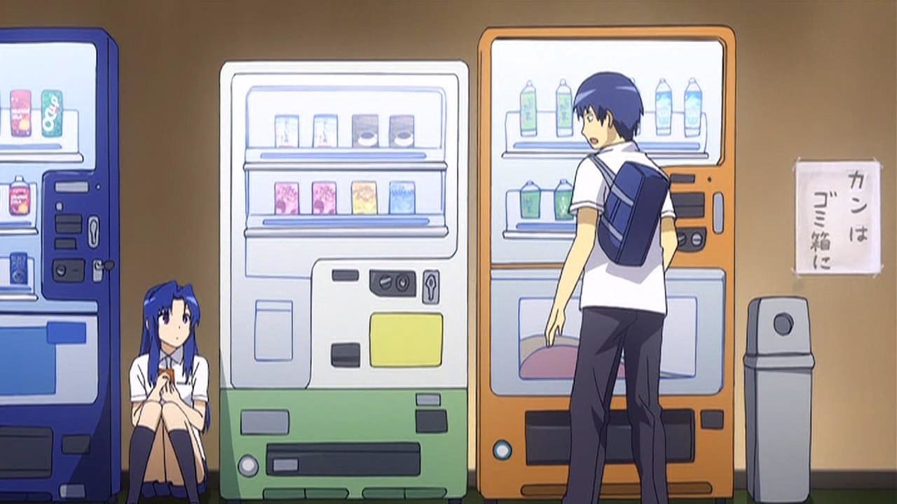 Two anime characters standing and sitting near vending machines