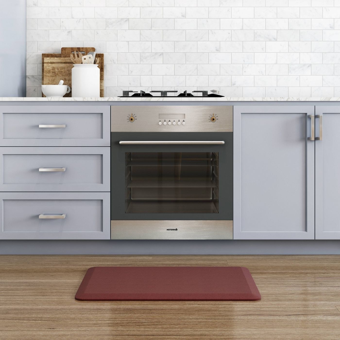 red anti fatigue mat in front of a stove