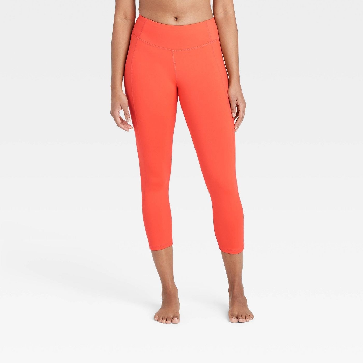 A pair of bright orange leggings