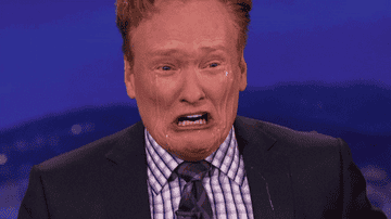 Conan cries with crocodile tears running down his face